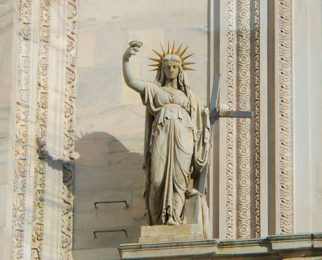 Duomo Cathedral - Lady Liberty in Milan, Italy